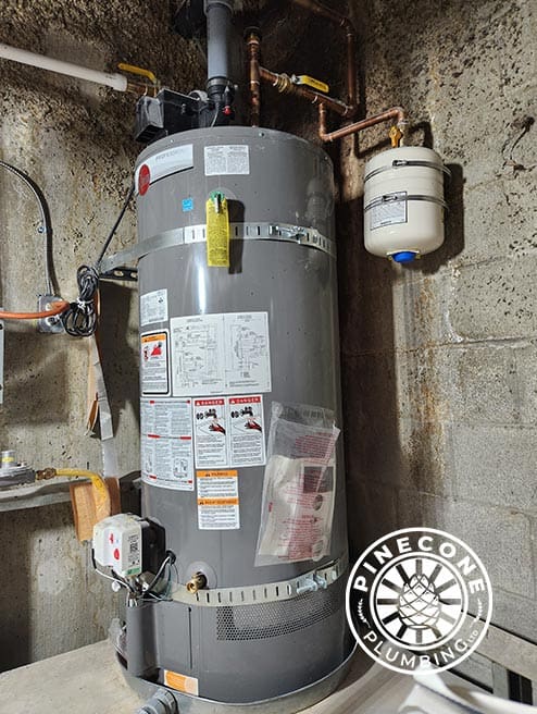 Plumbing contractor performing boiler maintenance in Whistler